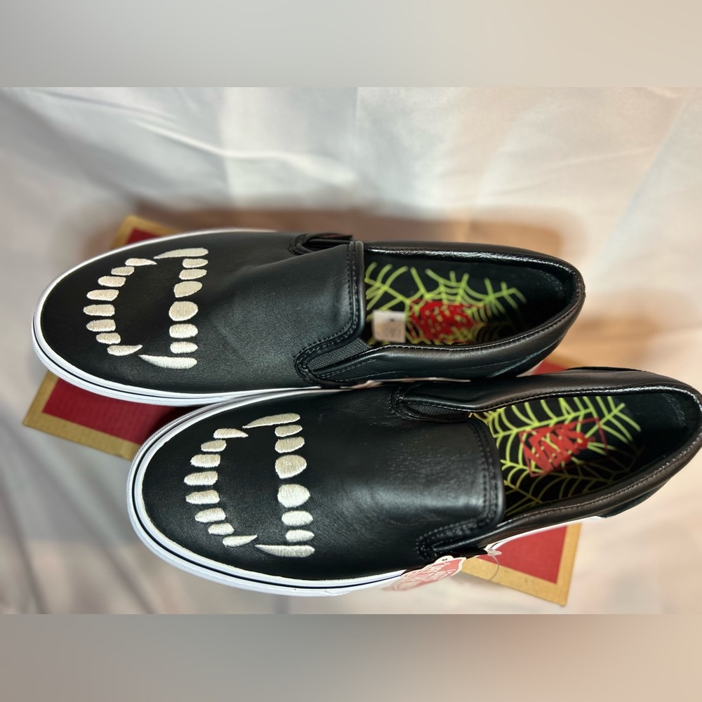 Men’s Vans Black Leather Slip on shoes with Fangs, never worn, size 10